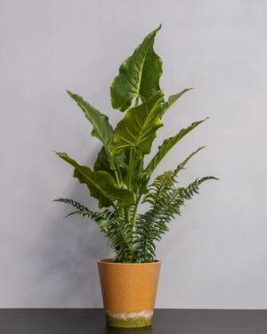 Konstgjord Alocasia krukväxt